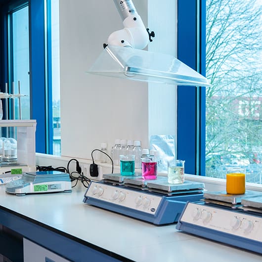 Vitablend's lab with view on a scale and beakers