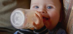 Baby drinking from a bottle