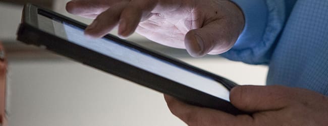 Operator using an I-pad
